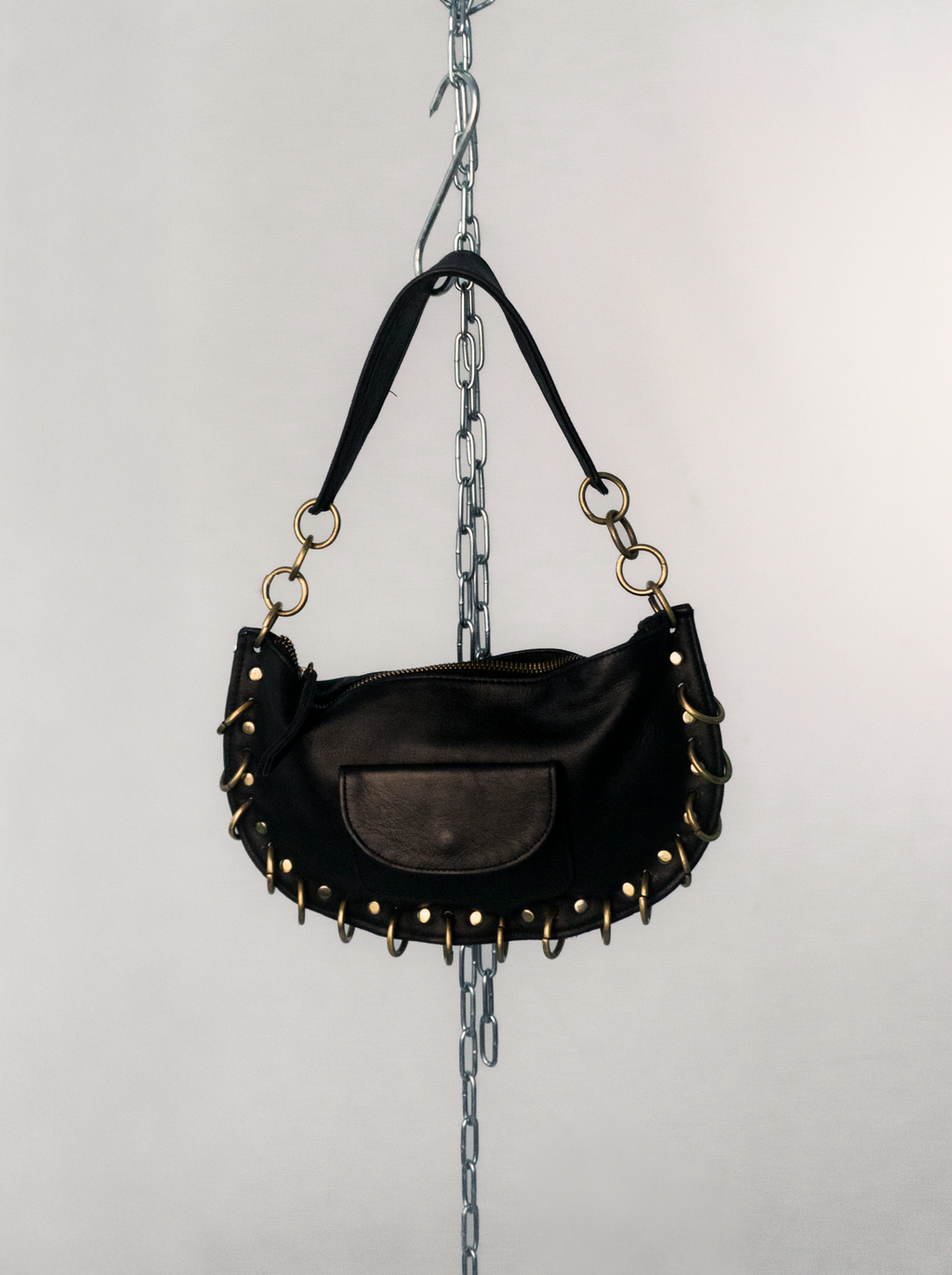 PIERCED BLACK BAG