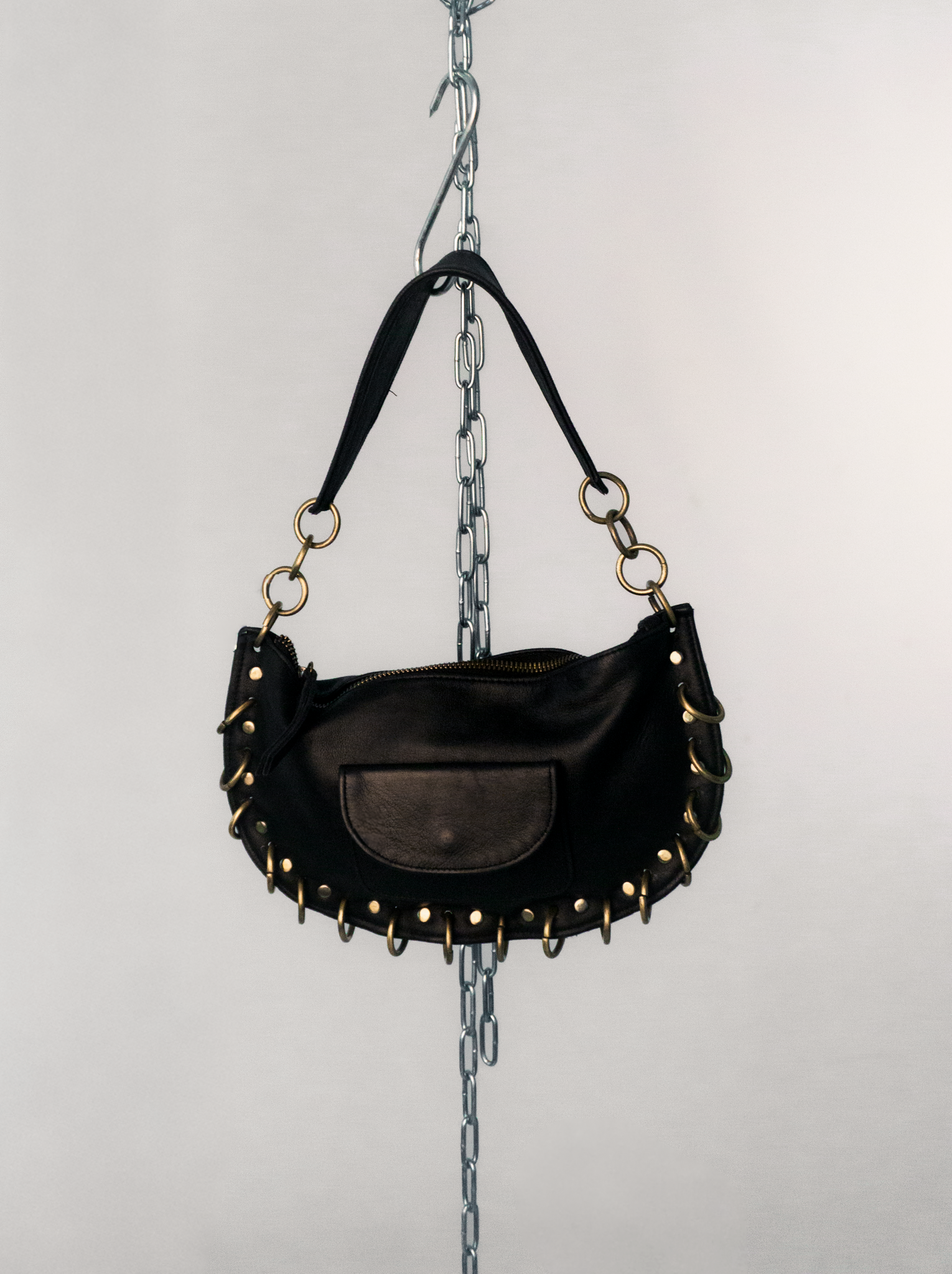 PIERCED BLACK BAG